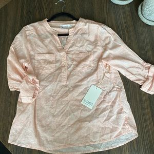 Carve designs blouse. Size M.